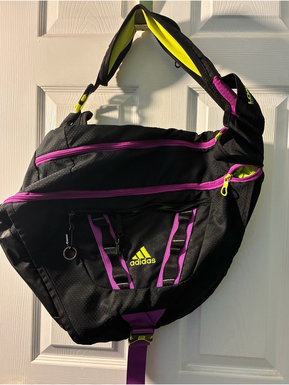 adidas Black Crossbody Sling Bag with Purple Trim and Neon Yellow Accents